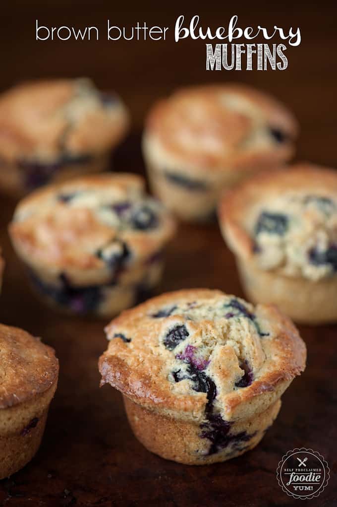 homemade blueberry muffins on brown serving platter