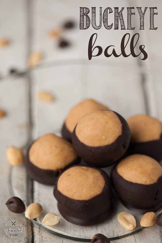 Buckeye Balls are a classic no bake peanut butter ball dipped in chocolate. I'll tell you how to make buckeyes and why they're perfect for the holidays!