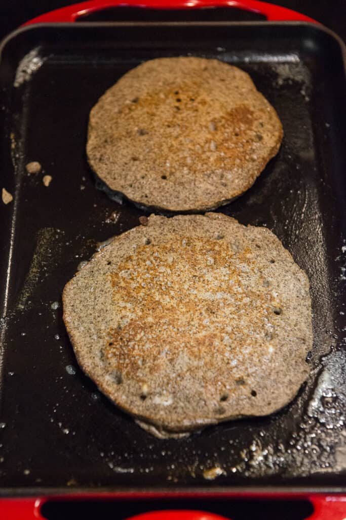 cooked Buckwheat Pancakes on griddle