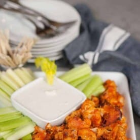These Buffalo Cauliflower Bites taste so much like traditional chicken wings, but are a healthy vegetarian version perfect for a light snack.