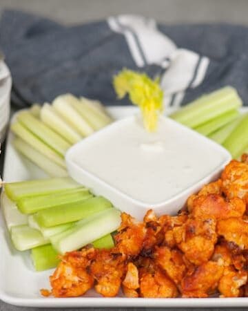 These Buffalo Cauliflower Bites taste so much like traditional chicken wings, but are a healthy vegetarian version perfect for a light snack.