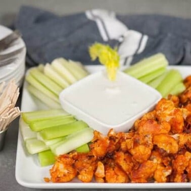 These Buffalo Cauliflower Bites taste so much like traditional chicken wings, but are a healthy vegetarian version perfect for a light snack.