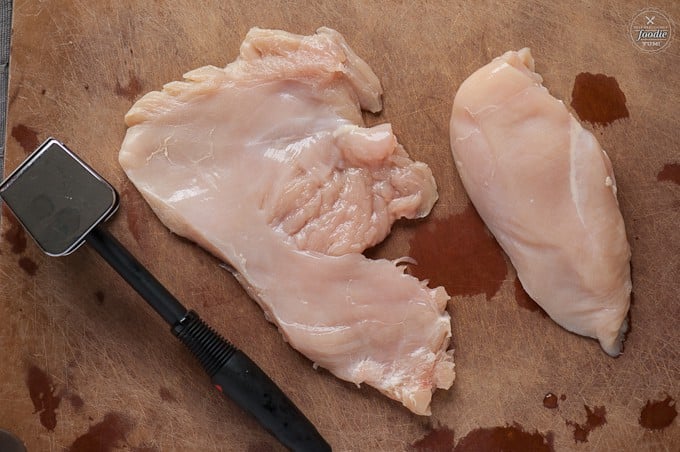 raw chicken on a cutting board