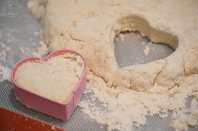 cutting hear shaped scones out of dough