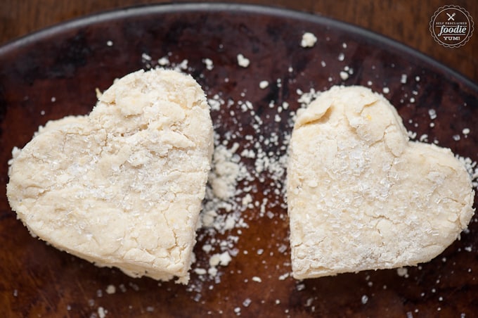 heart shaped buttermilk lemon scones on baking sheet prior to baking