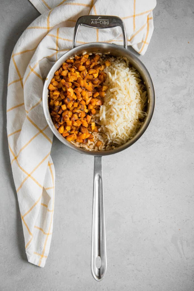 risotto and roasted butternut squash in pan