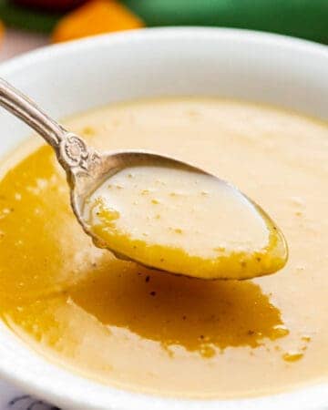 creamy Butternut Squash Soup in bowl with spoon