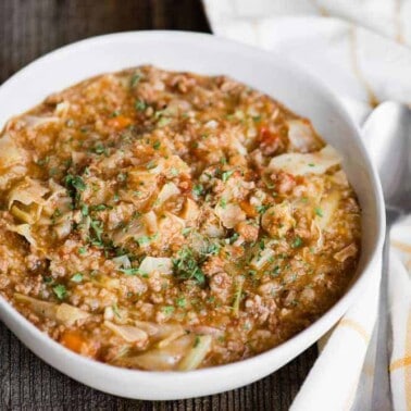 Bowl of Instant Pot Cabbage Roll Soup with beef, pork, and rice
