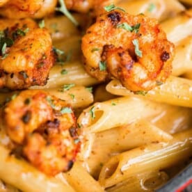 close up of cajun shrimp pasta with cream sauce