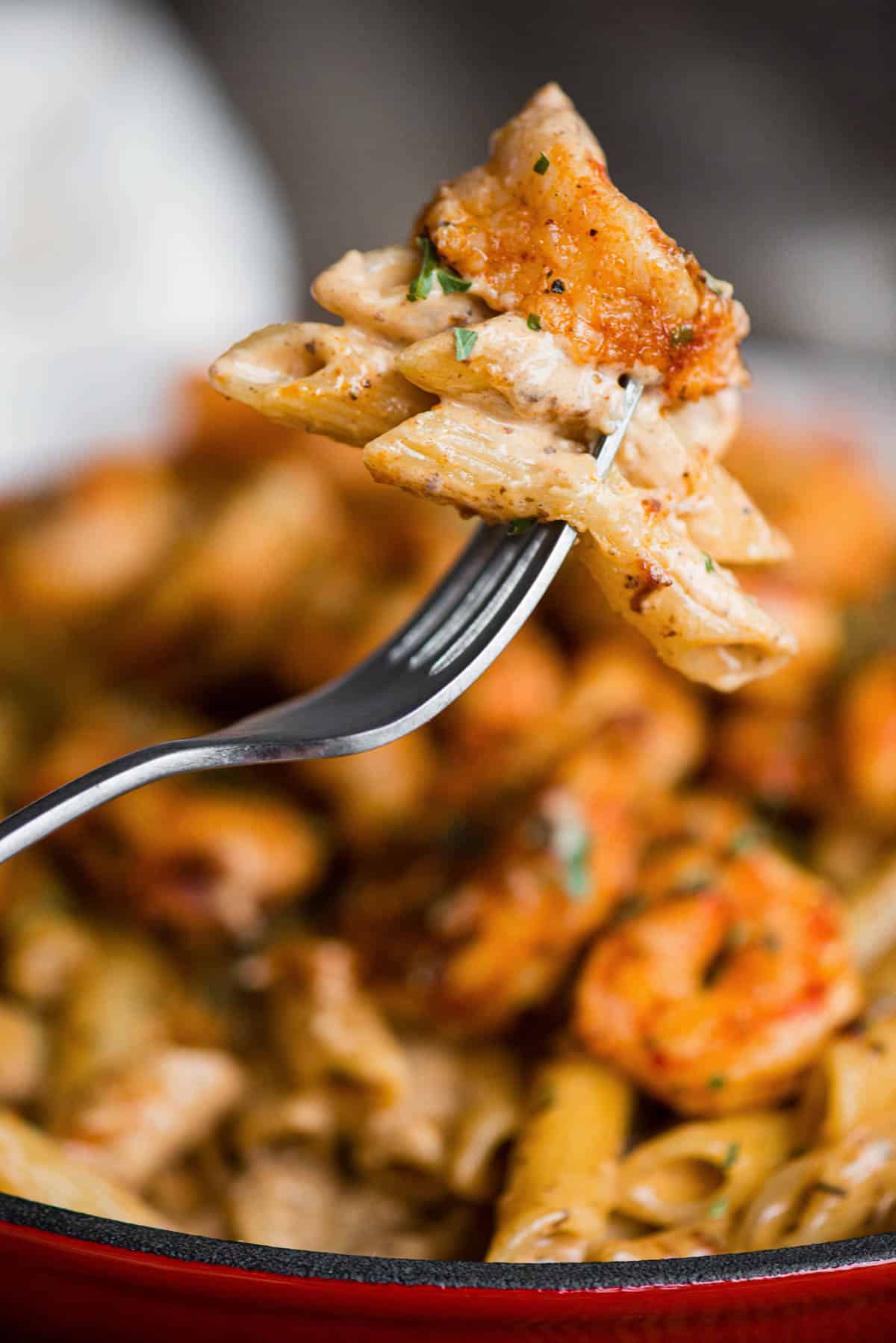 cajun shrimp pasta on fork.