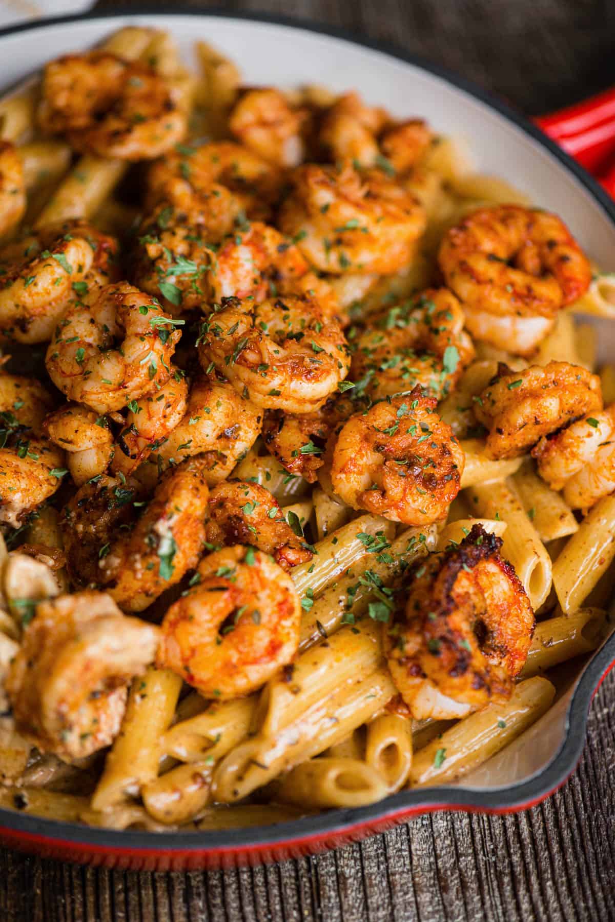 cajun shrimp pasta with cream sauce in large skillet