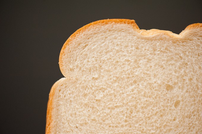 A close up of a slice of white bread