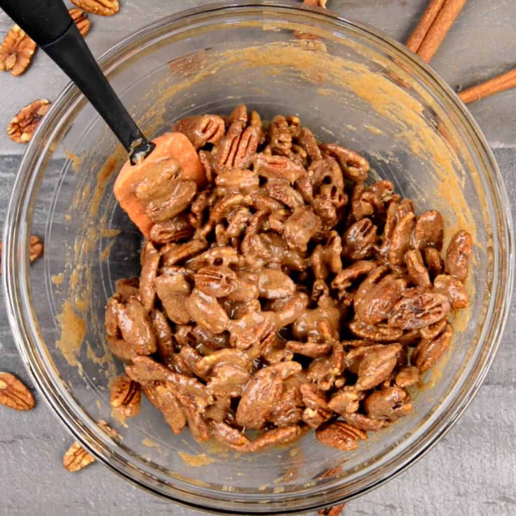 raw pecans mixed with egg white and sugar