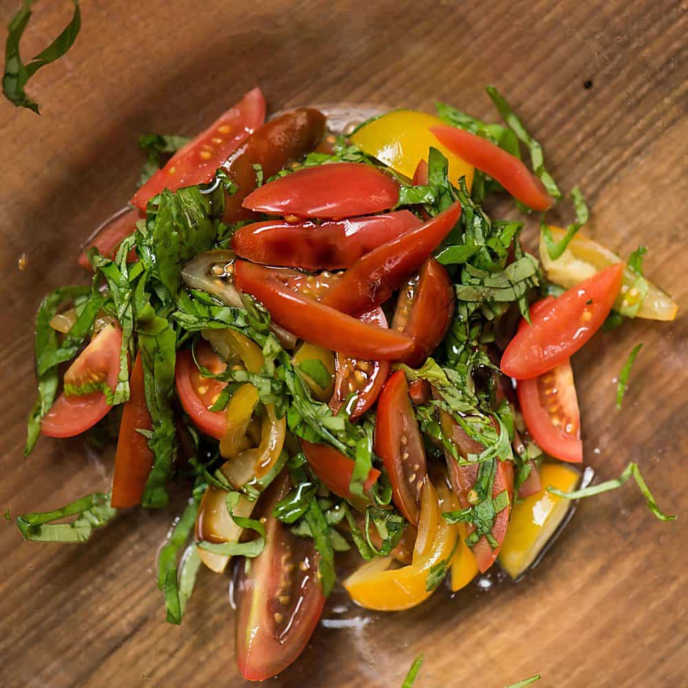 A close up of vegetables on a wooden table