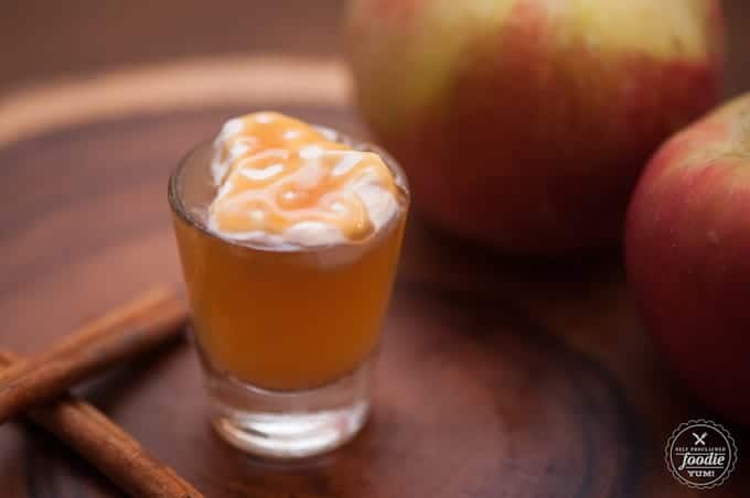 apple pie shot with caramel and whipped cream