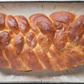 Challah Bread is a delicious yeast enriched egg bread that holds significant religious meaning. Enjoy it during Hanukkah or family Sunday dinner.