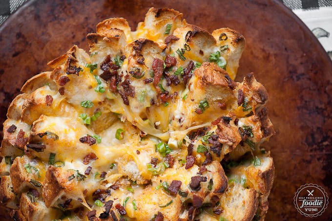 pull apart bread with melted cheese and bacon