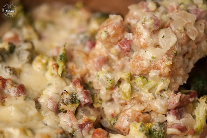 scoop of casserole made of tater tots, chicken and broccoli