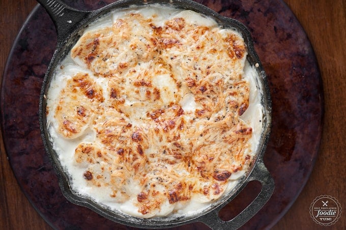 looking down at a pan of cheesy scalloped potatoes