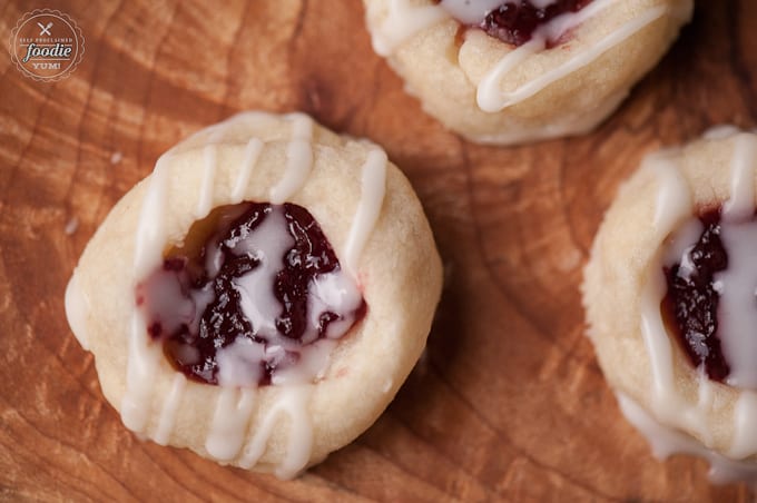 A close up of a cherry almond thumbprint