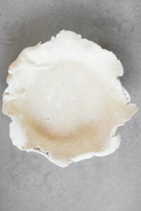 uncooked homemade pie crust in dish