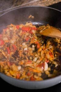 stirring diced vegetables for Chicken Cacciatore recipe