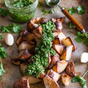 pan of roasted potatoes and Chimichurri sauce