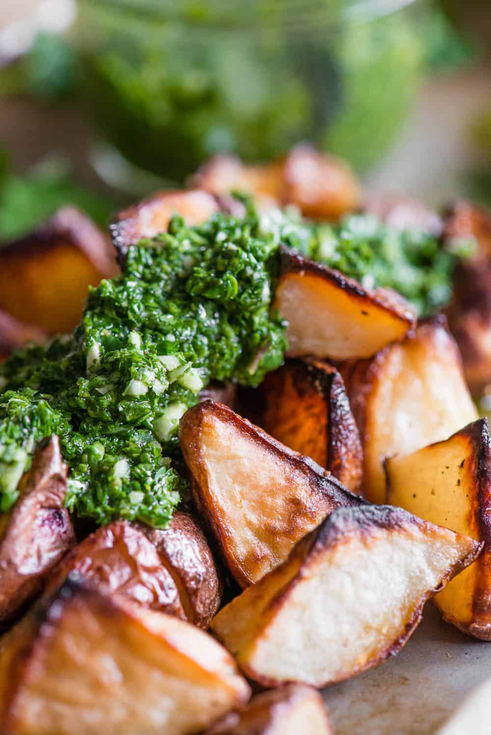 roasted potatoes topped with homemade Chimichurri sauce