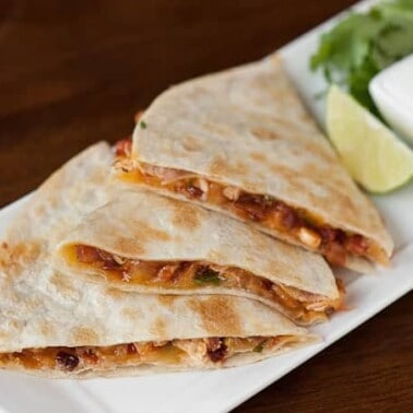 These Chipotle Chicken Quesadillas make great use of leftover shredded chicken for an incredibly delicious appetizer or tasty meal.