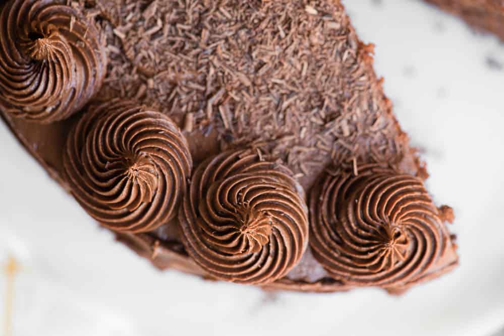 swirls of chocolate icing on cake
