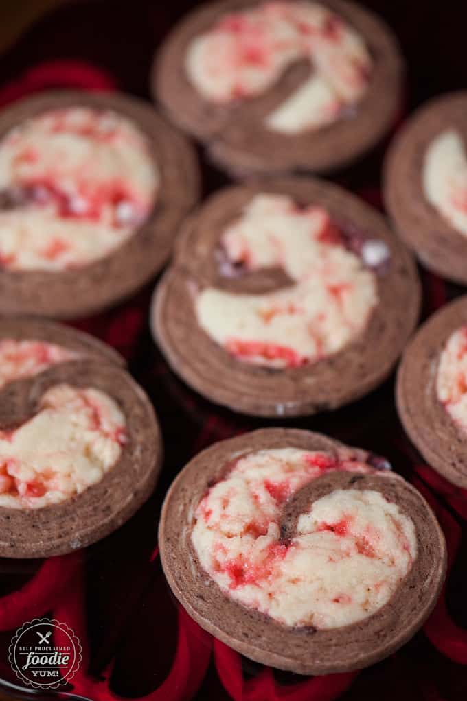 chocolate peppermint swirl cookies laid out on a cutting board