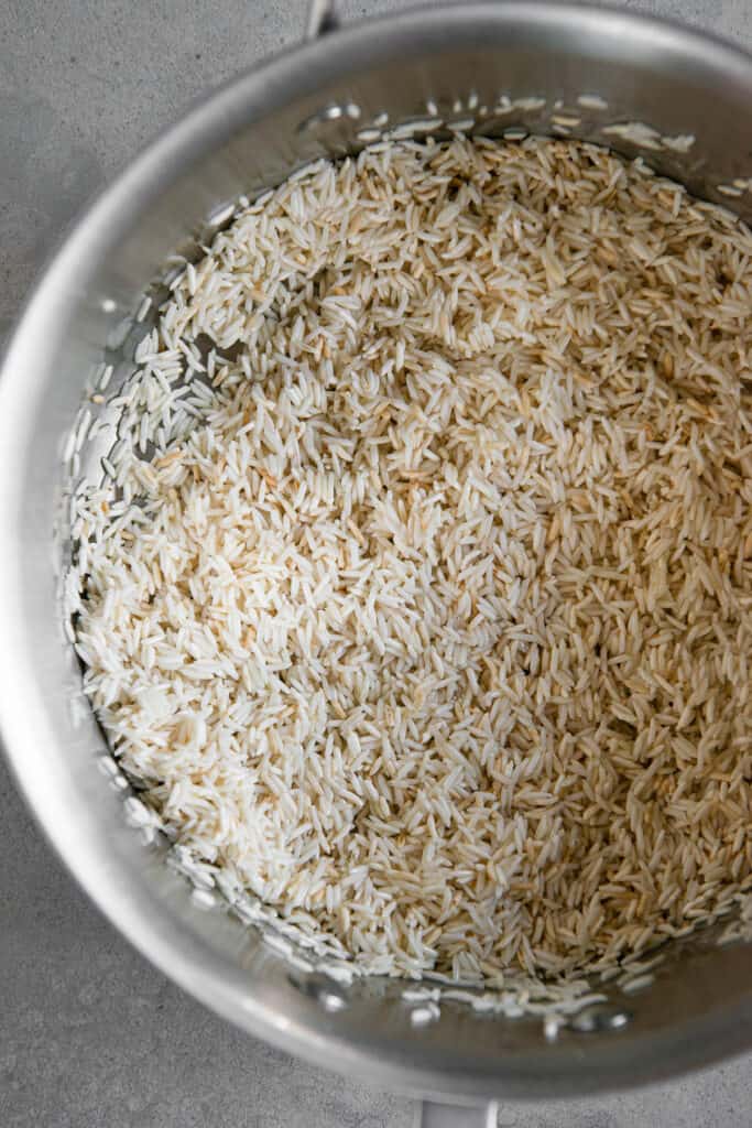 toasted long grain rice in pot