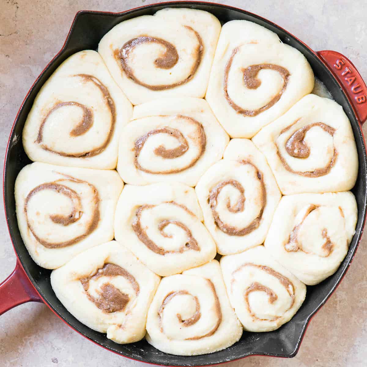 uncooked Homemade Cinnamon Rolls that have risen