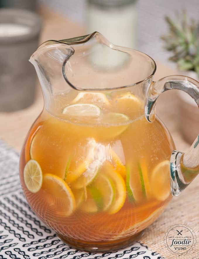 pitcher with beer and citrus slices