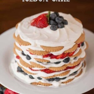 A cake on a plate, with Berry and Cream