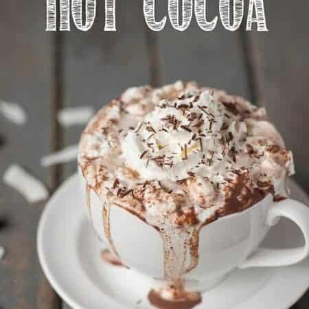 Rich and decadent Coconut Rum Hot Cocoa made from milk, half and half, chocolate, and coconut rum will warm your belly and put a smile on your face!