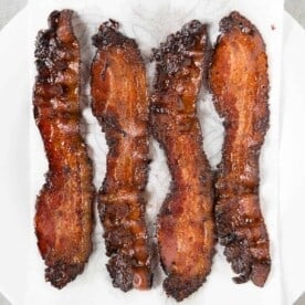 four slices of oven baked bacon