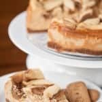 a slice of cookie butter cheesecake on a plate