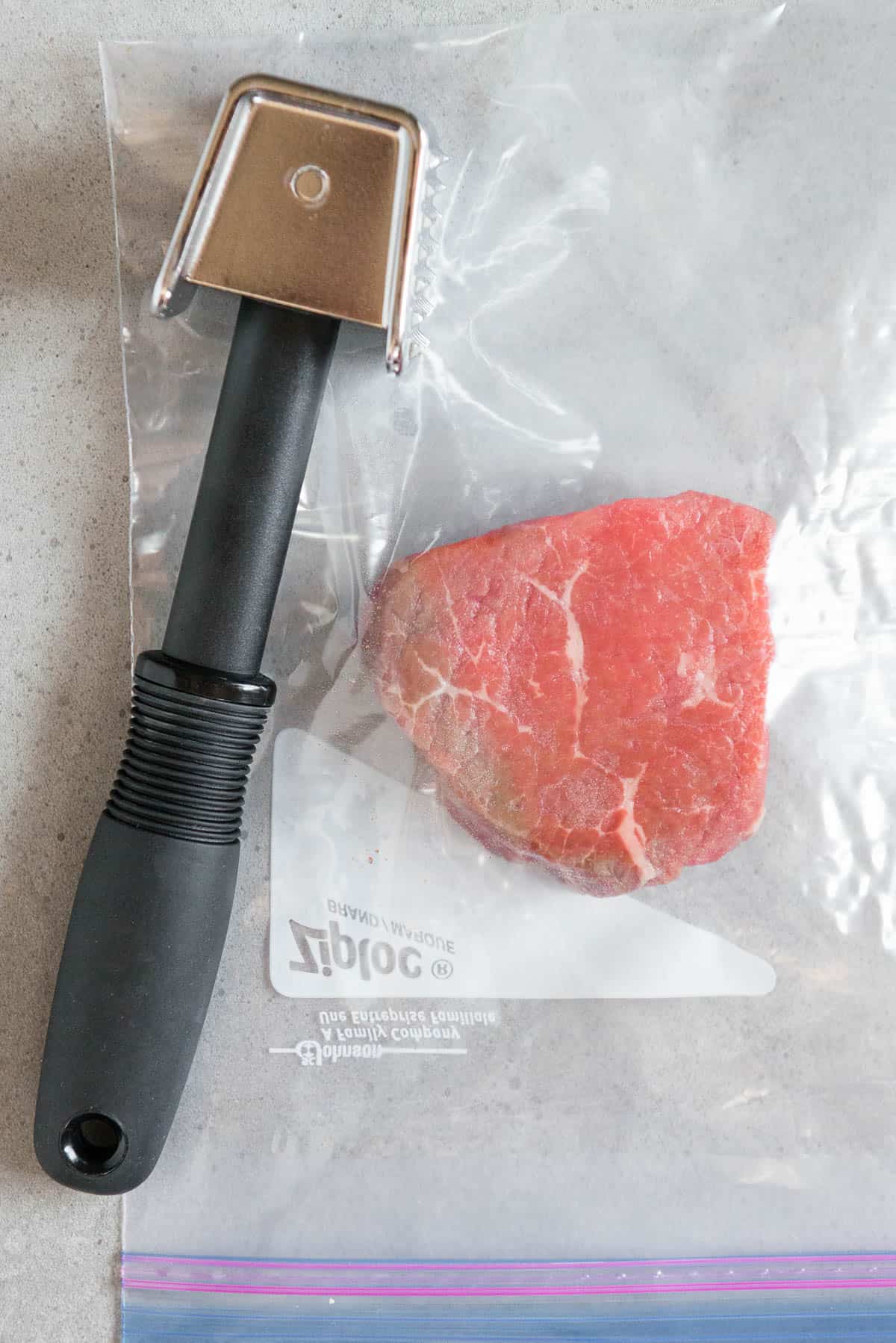 round steak in plastic bag