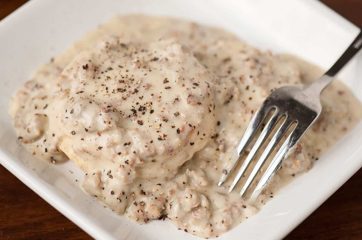 homemade country sausage gravy over a biscuit.