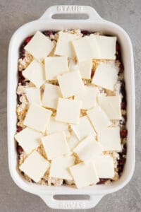 thin slices of butter on a fruit cobbler