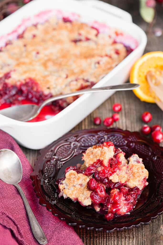 homemade Cranberry Cobbler on red plate
