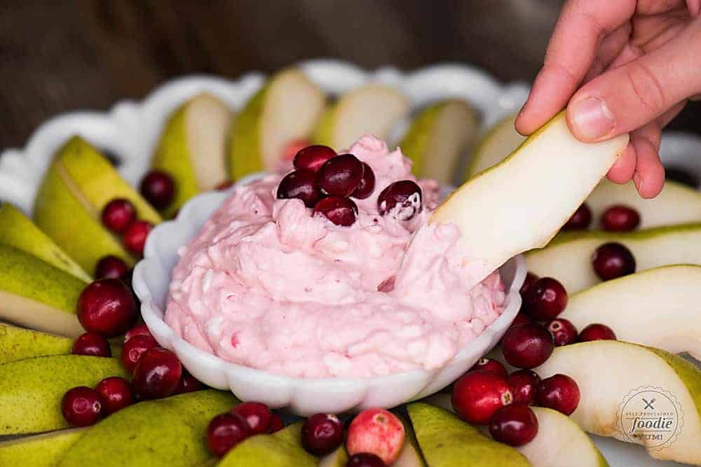 Cream cheese fruit dip with cranberry sauce.