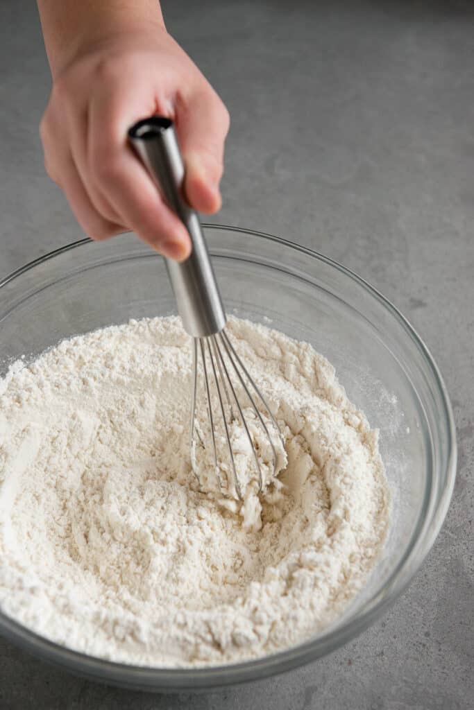 whisking dry ingredients for pancake recipe