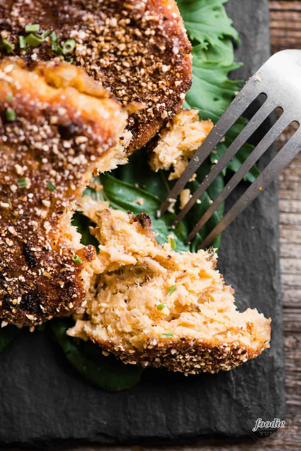 bite of salmon patties made with canned salmon