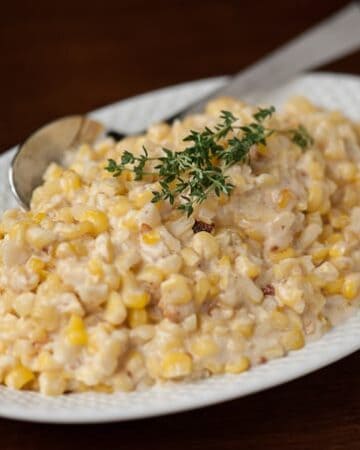 This savory Decadent Slow Cooker Creamed Corn made from fresh corn tastes nothing like the stuff from a can and is so simple to make in your slow cooker.