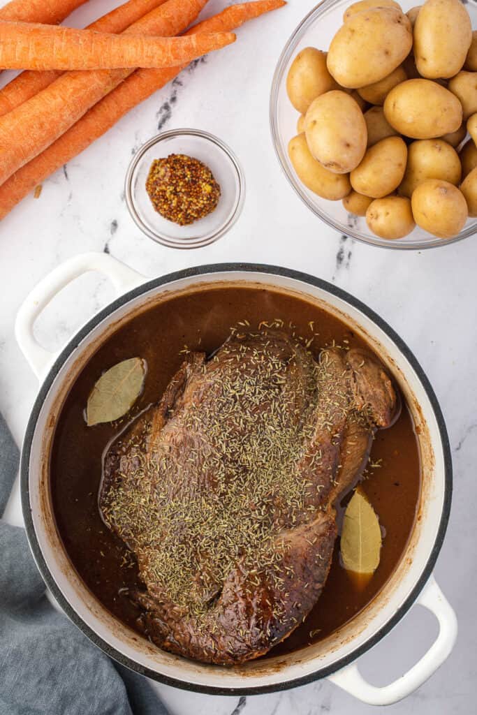 https://selfproclaimedfoodie.com/wp-content/uploads/dutch-oven-pot-roast-13-683x1024.jpg