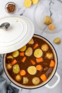 potatoes and carrots in Dutch oven