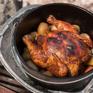 Nothing beats a good hot dog by the campfire, but sometimes a complete main course like this mouthwatering Dutch Oven Roasted Chicken just hits the spot.