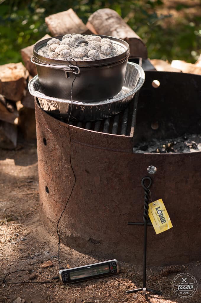 dutch oven stove on fire pit with coals